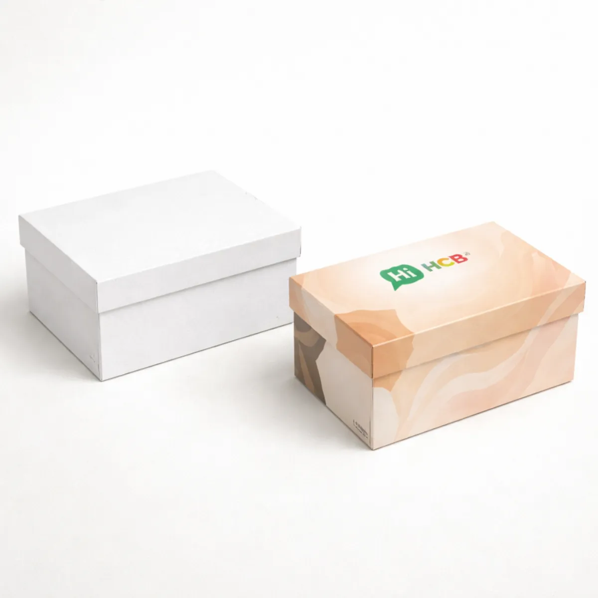 Several high-quality shapewear packaging boxes displayed together to show different sizes and sophisticated matte colour tones- class=